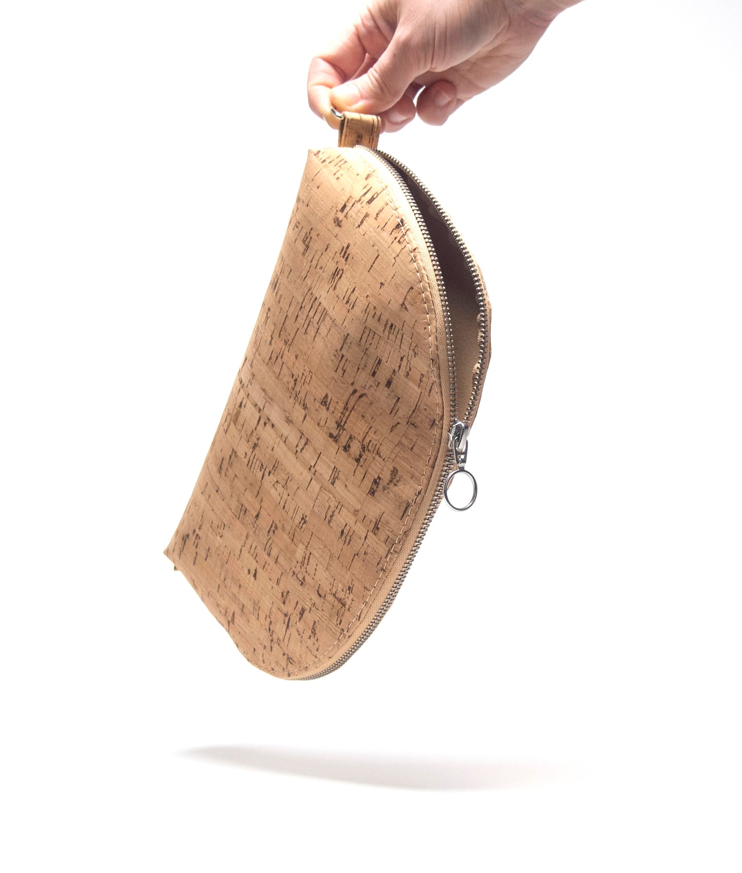 You may hang the Aavi beauty bag from its loop and partly open it to get pieces from it.